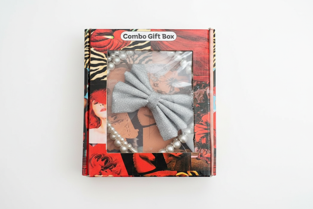Silver glitter hair bow and pearl bracelet combo gift box on white background