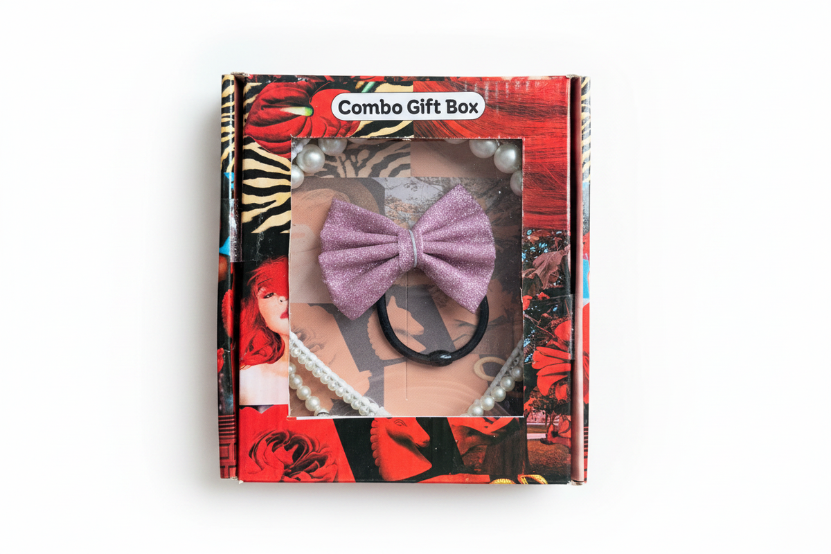 Purple glitter bow hair tie and pearl headband combo gift box on white background